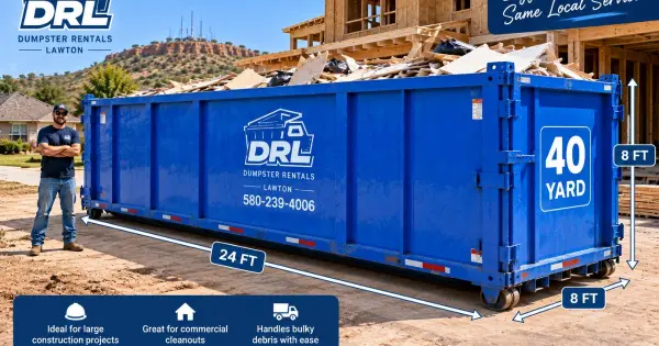 40 yard dumpster at a large construction site with a worker, building materials, and construction framing in Lawton, Oklahoma
