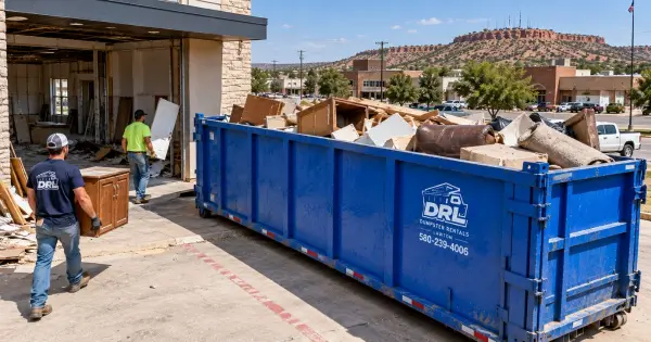 40 yard dumpster filled with cabinets, drywall, wood, carpet, furniture, doors, and renovation debris during a commercial cleanup in Lawton, Oklahoma